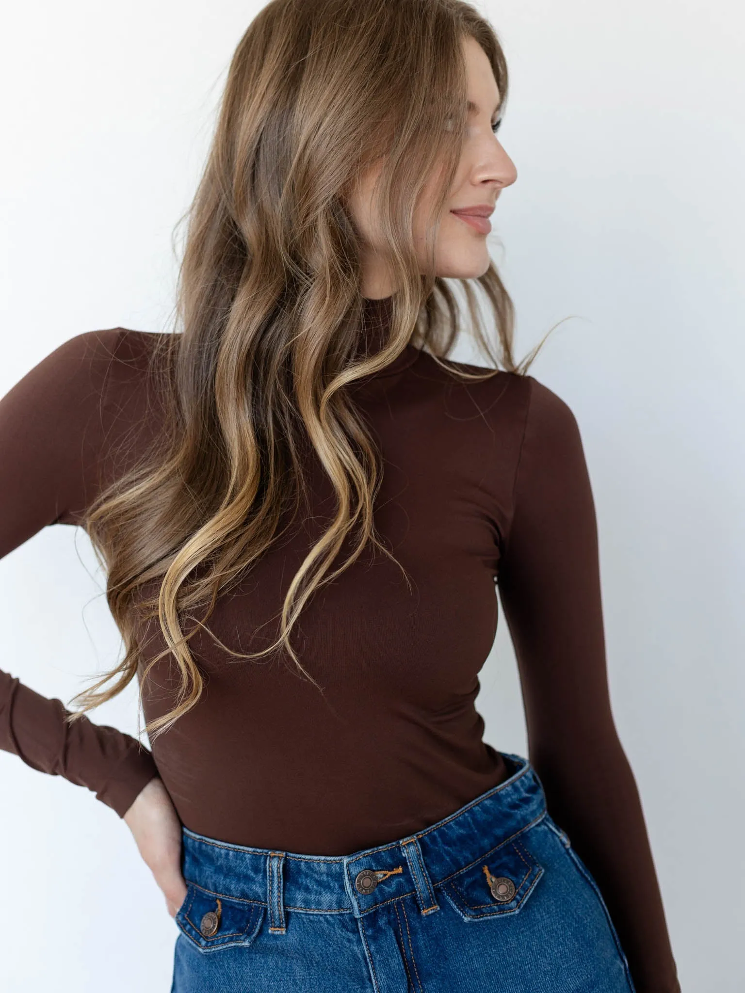 NIKIBIKI Long Sleeve Mock Neck Top