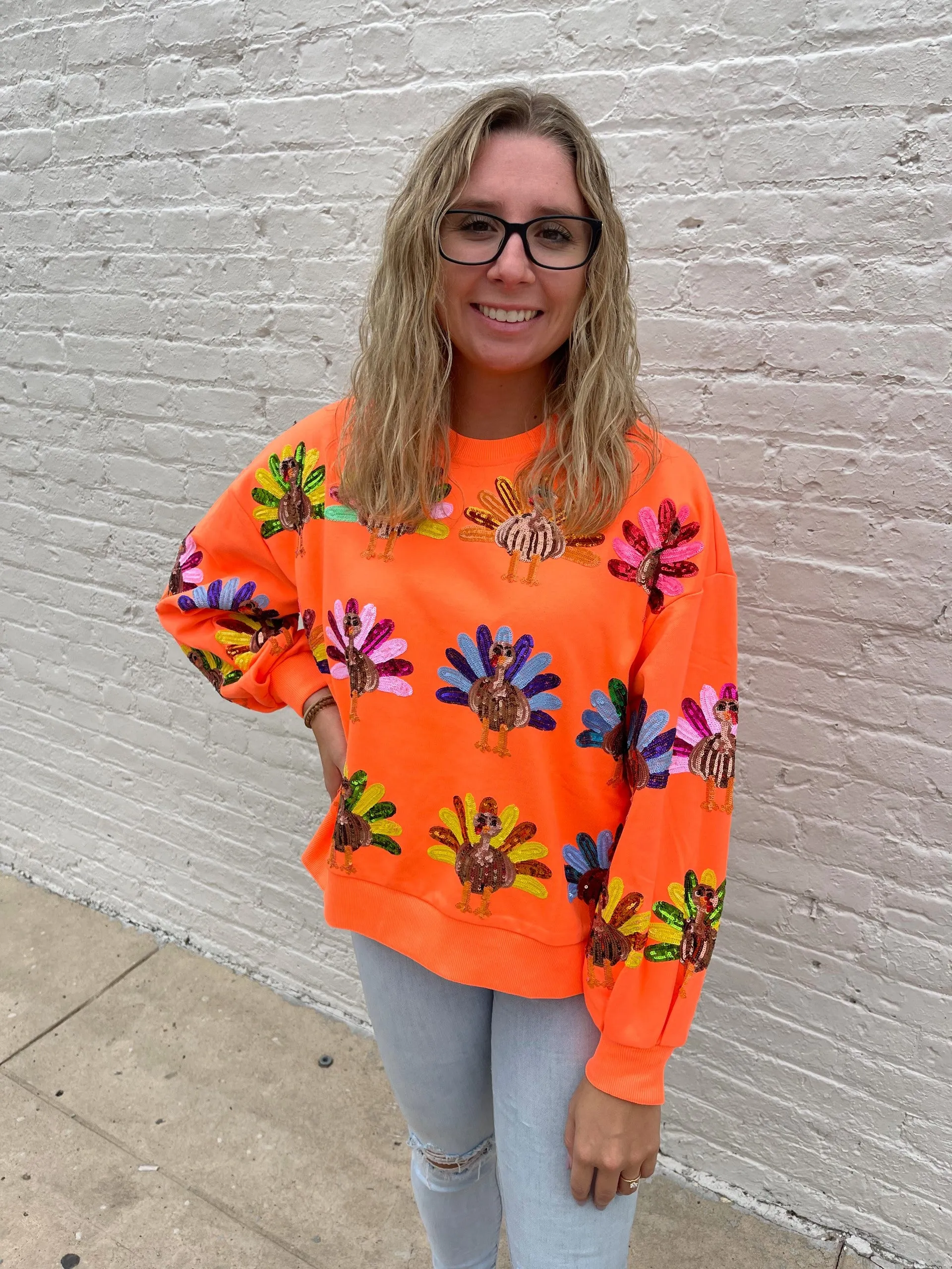 QUEEN OF SPARKLES TURKEY SWEATSHIRT - ORANGE