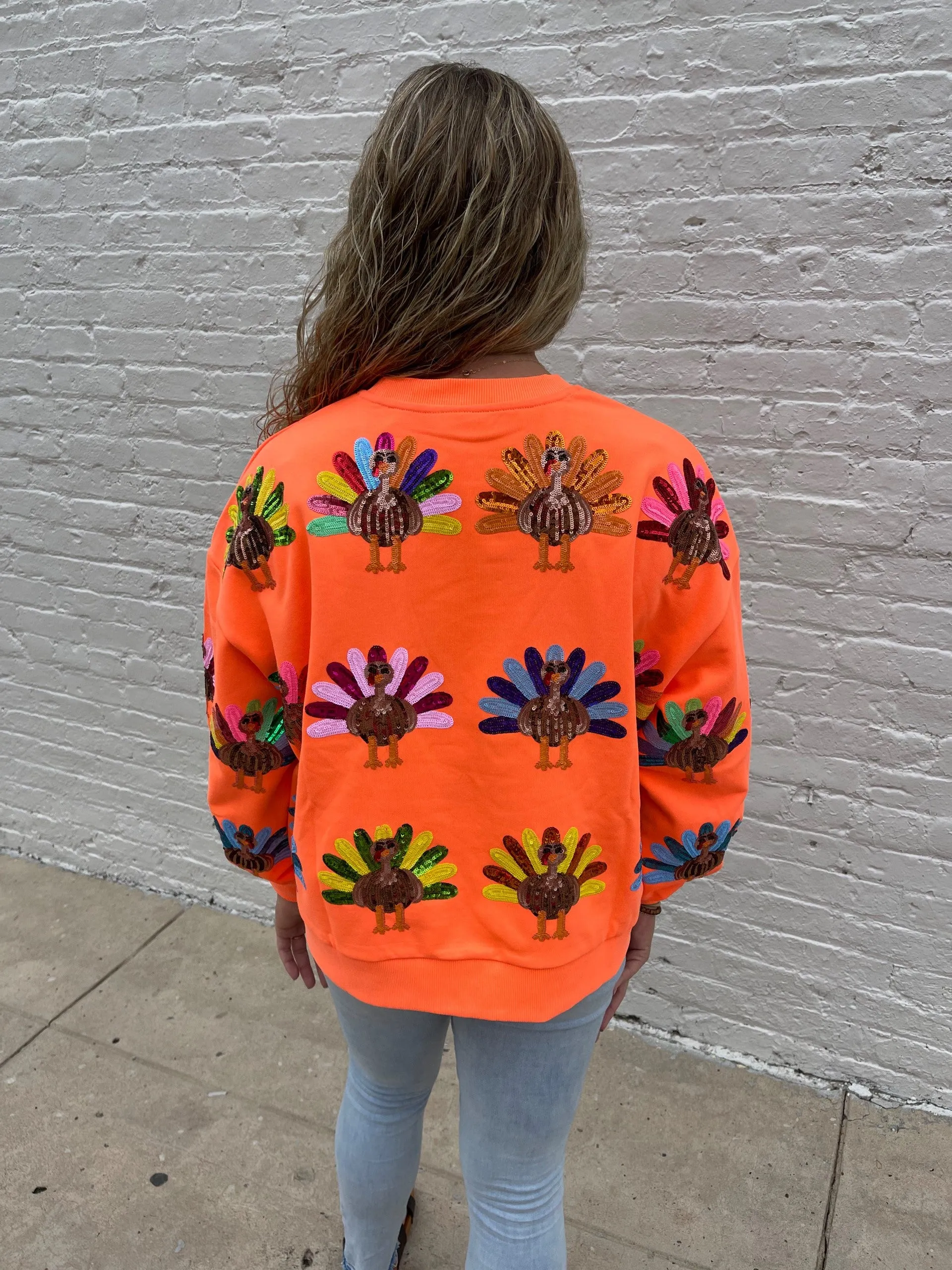 QUEEN OF SPARKLES TURKEY SWEATSHIRT - ORANGE