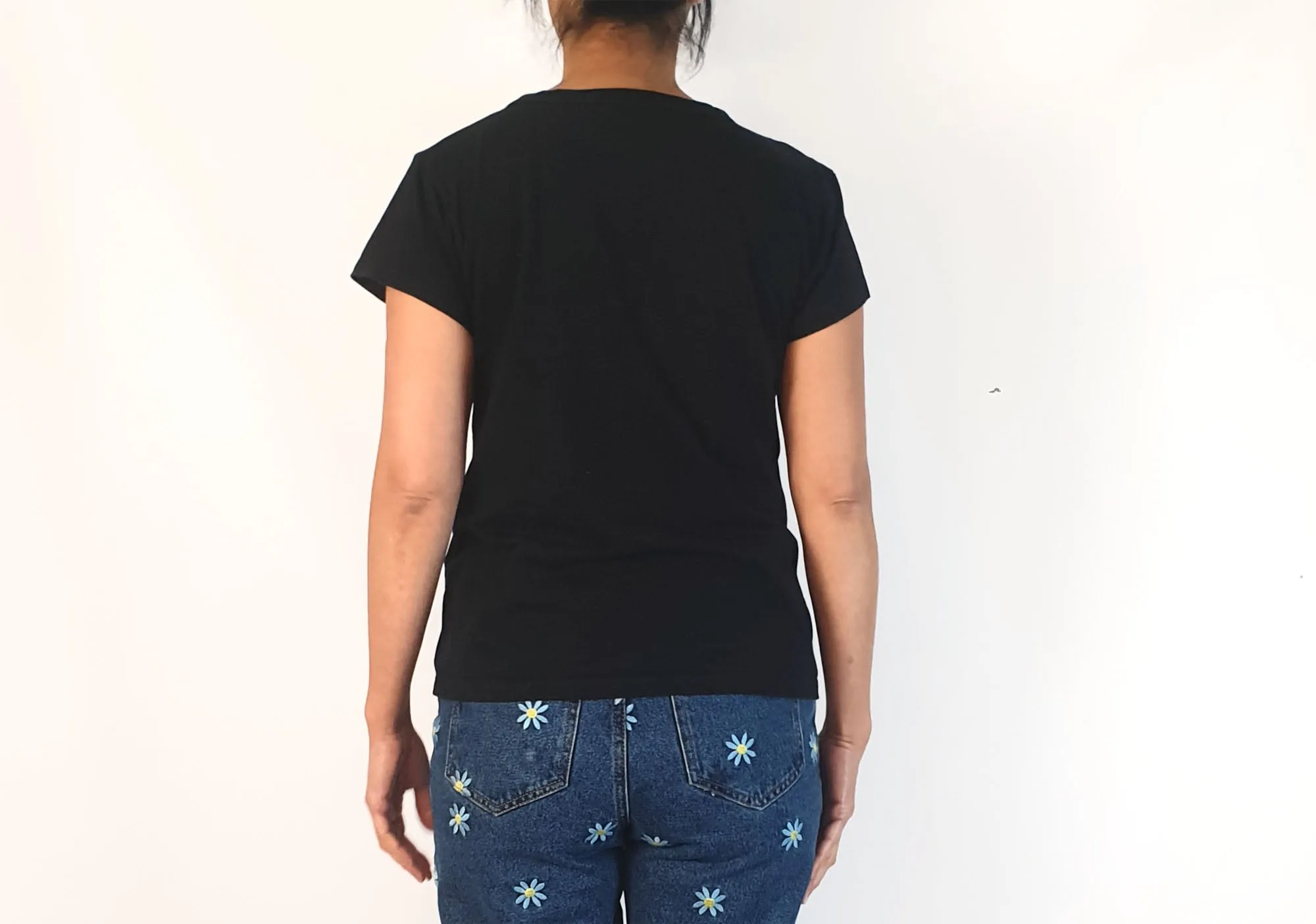 Skin & Threads classic black tee shirt size 2, best fits 10
